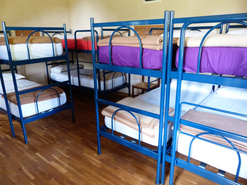 Bunk beds in a hostel dorm room.